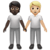 🧑🏿‍🤝‍🧑🏼 people holding hands: dark skin tone, medium-light skin tone display on Apple